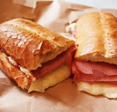 Hot sub sandwich with melted cheese at Spiro's Pizza & Pasta in Shoreline WA